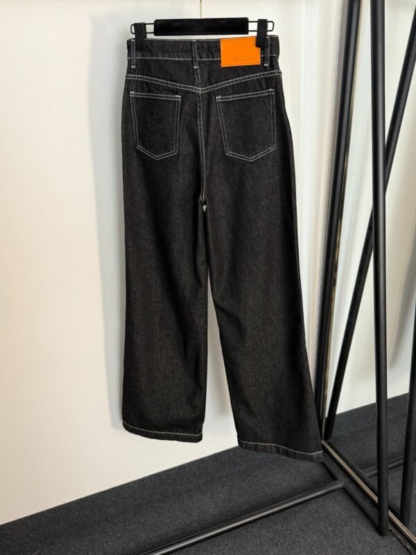 Loro Piana High-waisted straight-leg denim trousers with embroidered logo and leather patch on the back pocket