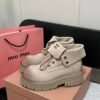 MIUMIU Martin boots