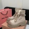 MIUMIU Martin boots