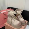 MIUMIU Martin boots