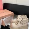 MIUMIU Martin boots