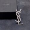 YSL brooch
