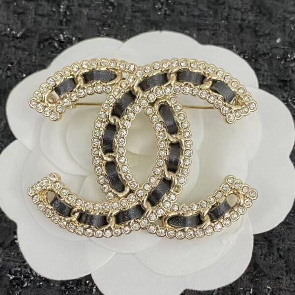 YSL brooch