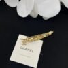 YSL brooch
