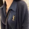YSL brooch