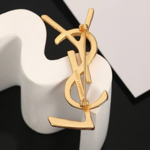 YSL brooch