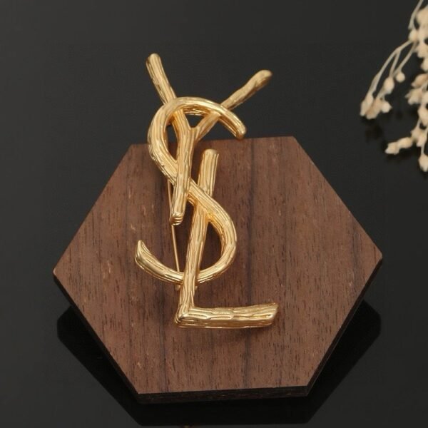 YSL brooch