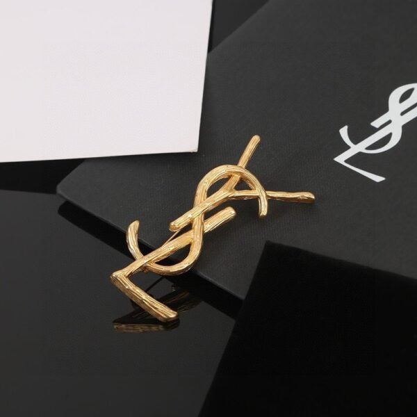 YSL brooch