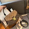Louis Vuitton clamshell satchel