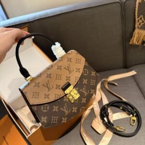 Louis Vuitton clamshell satchel