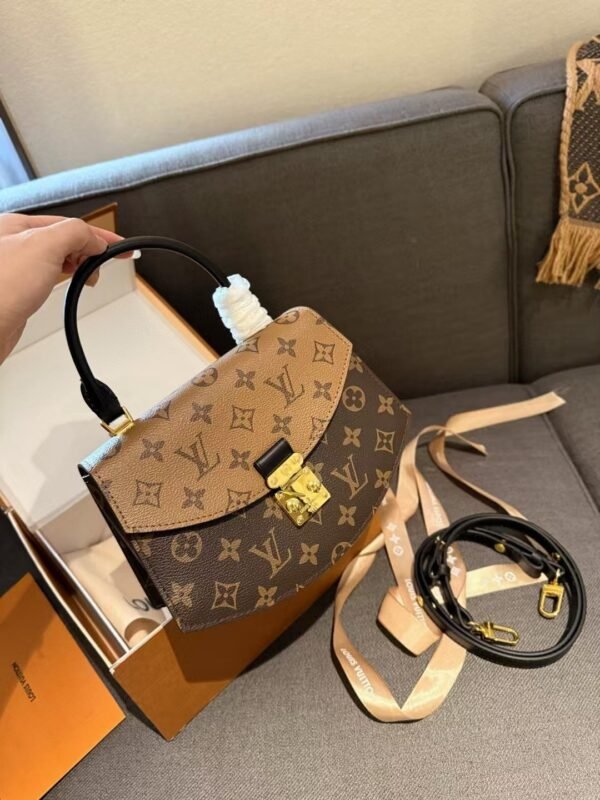 Louis Vuitton clamshell satchel