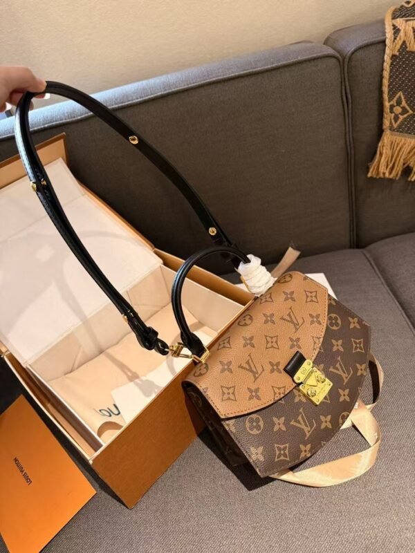 Louis Vuitton clamshell satchel