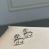 Hermès pig nose earrings