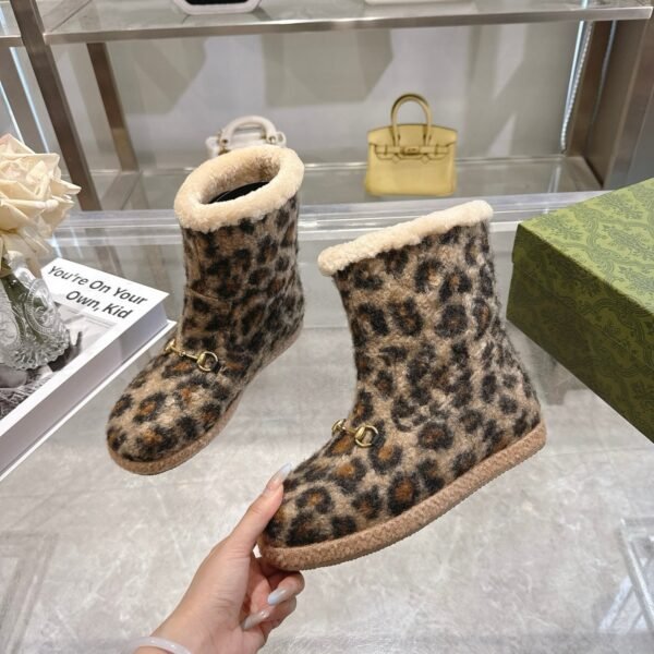 Gucci leopard print boots